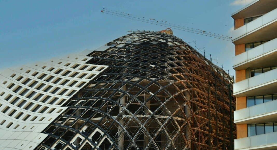 a large building with scaffolding on the side of it