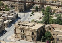 high-angle photography of beige concrete building