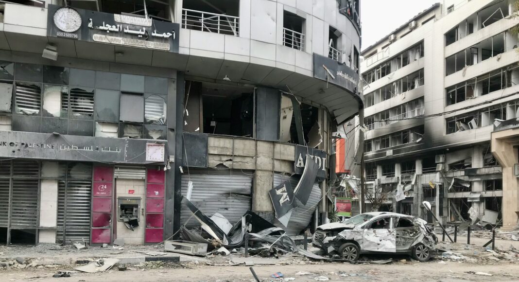 a run down building with a bunch of debris on the ground