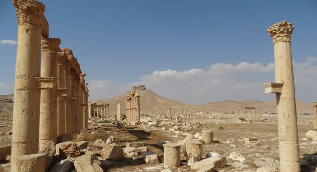 brown concrete building under blue sky during daytime