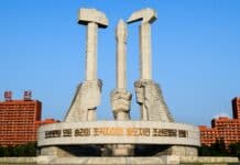 white concrete building under blue sky during daytime