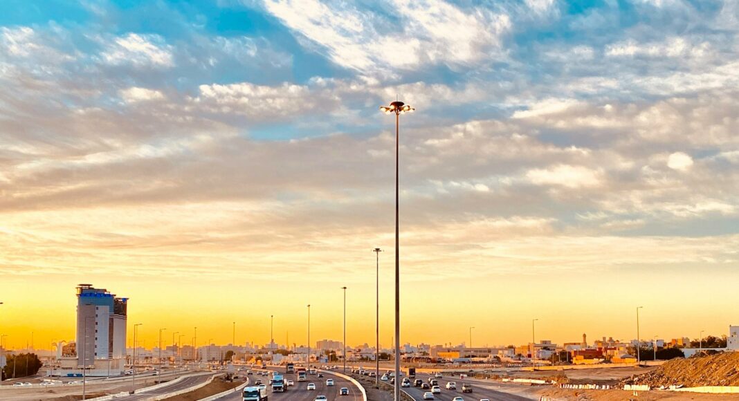 cars on road during sunset
