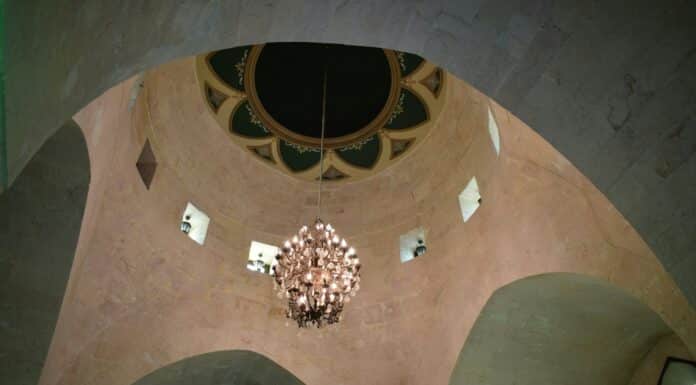 a chandelier hanging from the ceiling of a building