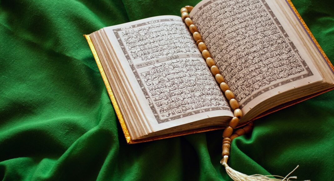 white book page on green textile