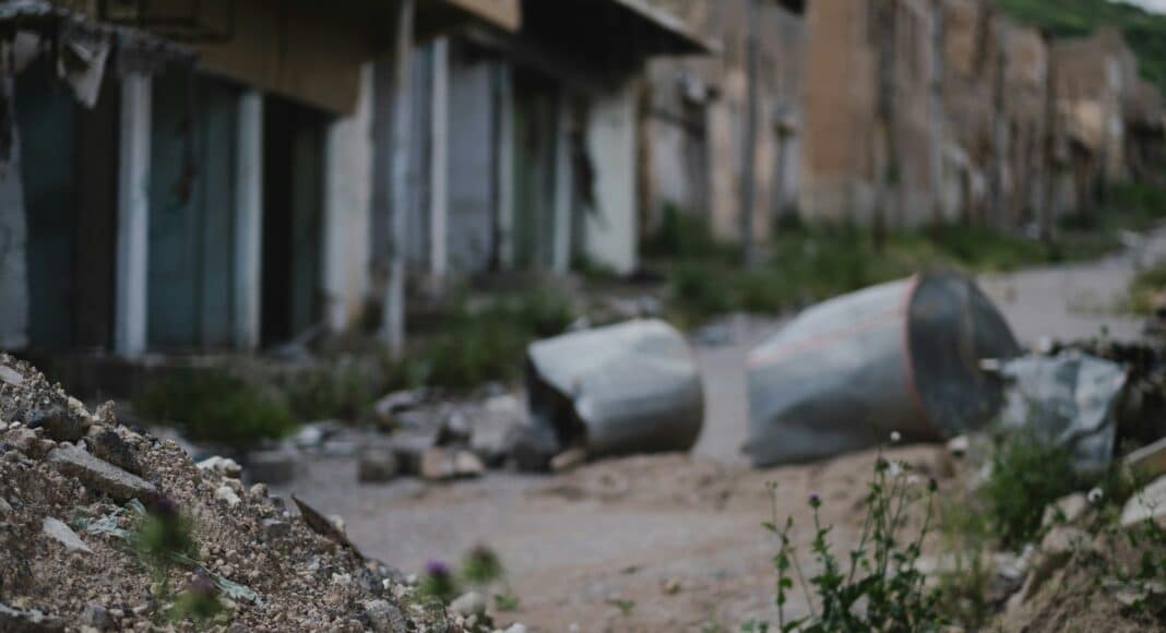 gray metal can on road