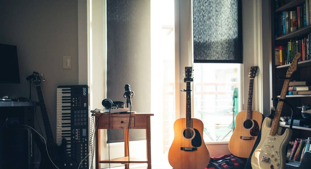 several guitars beside of side table