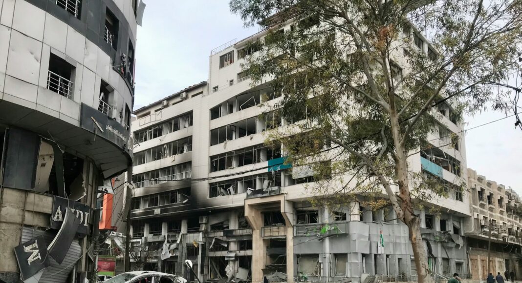 a building that has a bunch of debris in front of it