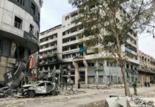 a building that has a bunch of debris in front of it