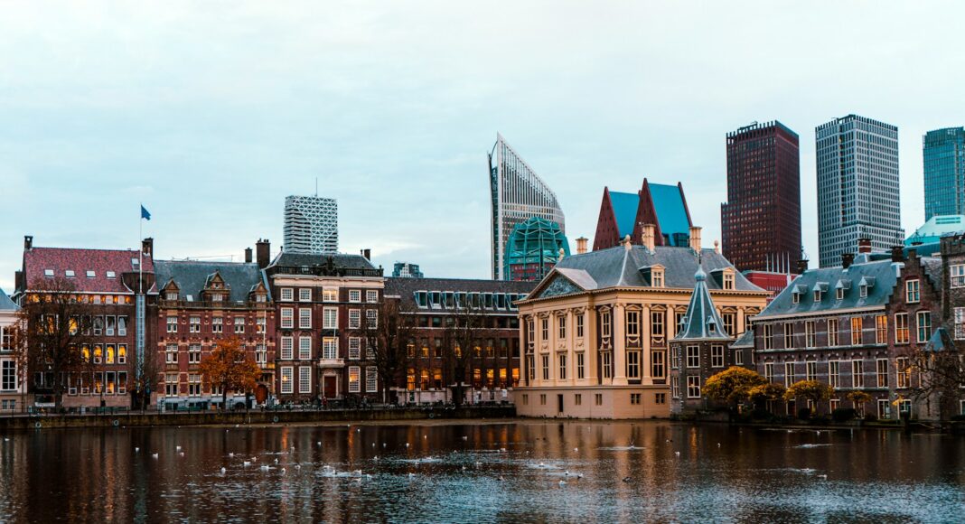 a large body of water surrounded by tall buildings