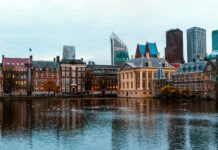 a large body of water surrounded by tall buildings