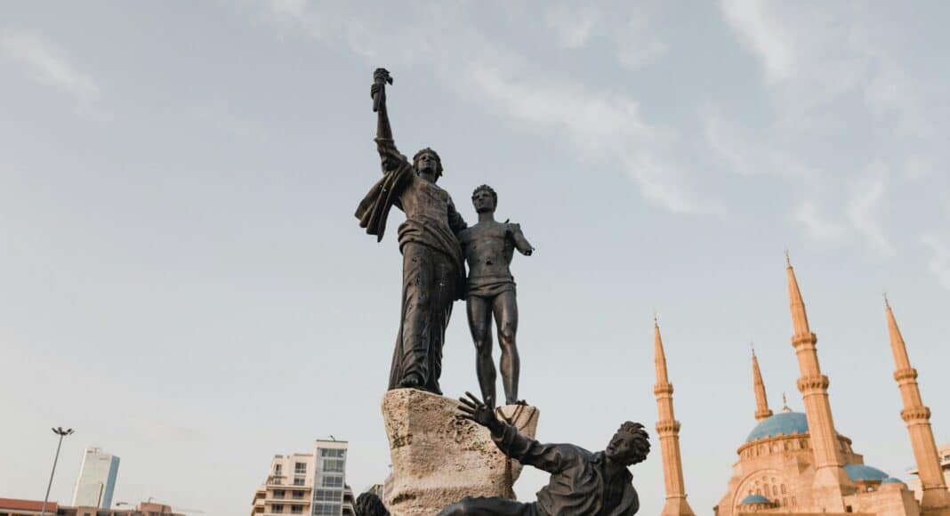 man in black suit statue