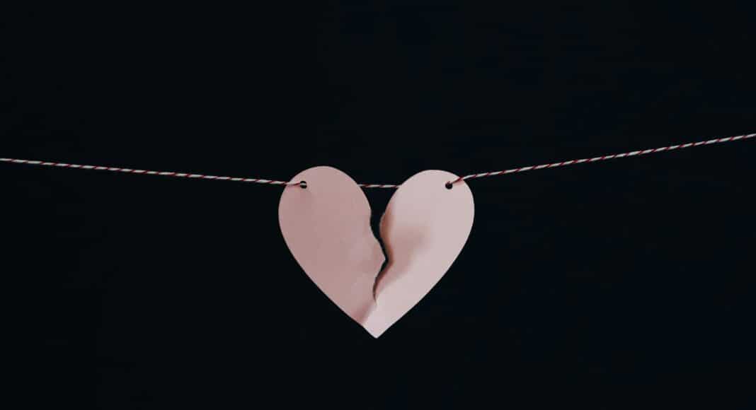 broken heart hanging on wire