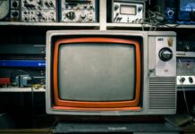 grey and orange CRT TV