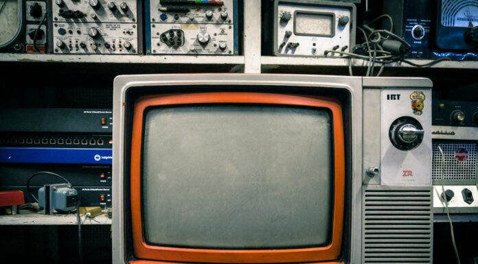 grey and orange CRT TV