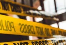 do not cross police barricade tape close-up photography