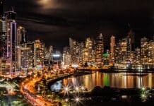 city lights and buildings during nighttime