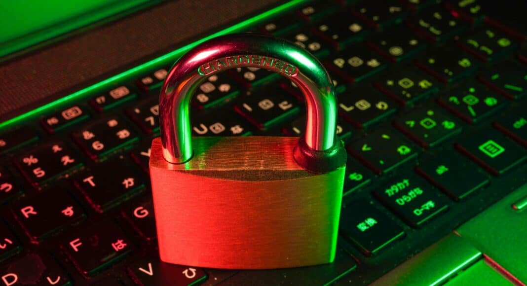 red padlock on black computer keyboard