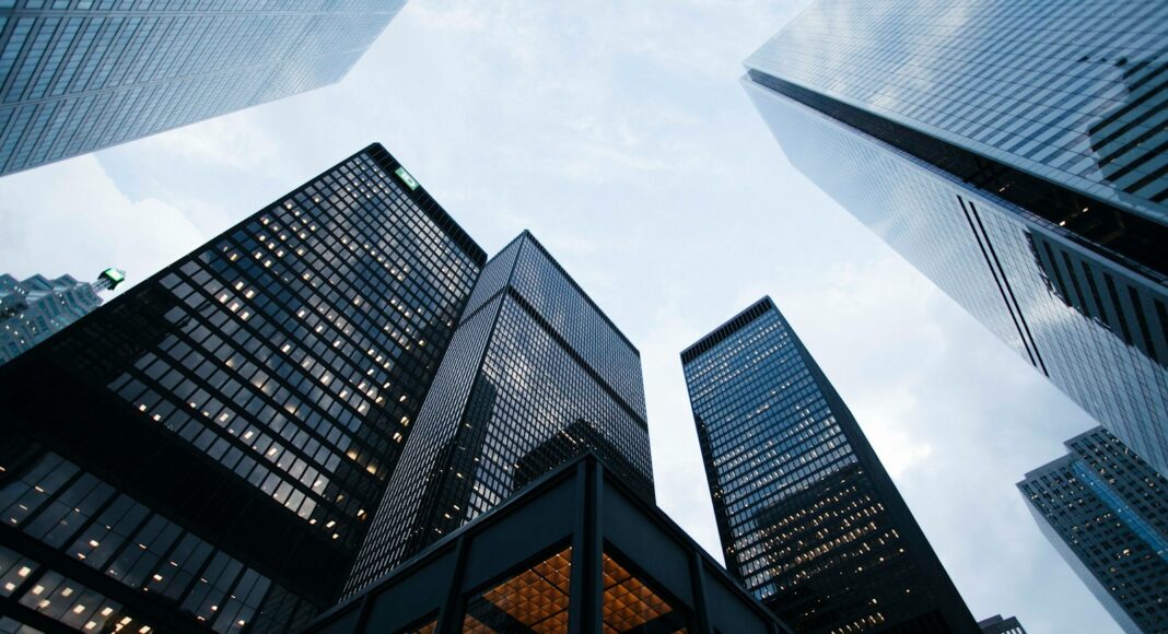 low angle photo of city high rise buildings during daytime
