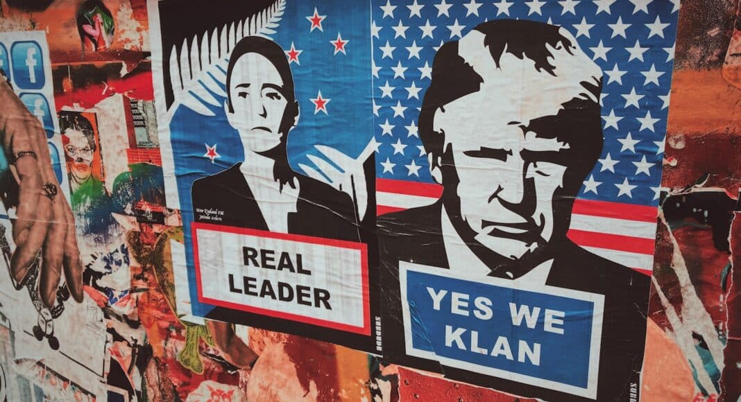 man in black suit jacket and black pants graffiti