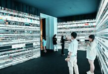 man in white dress shirt standing beside woman in black dress