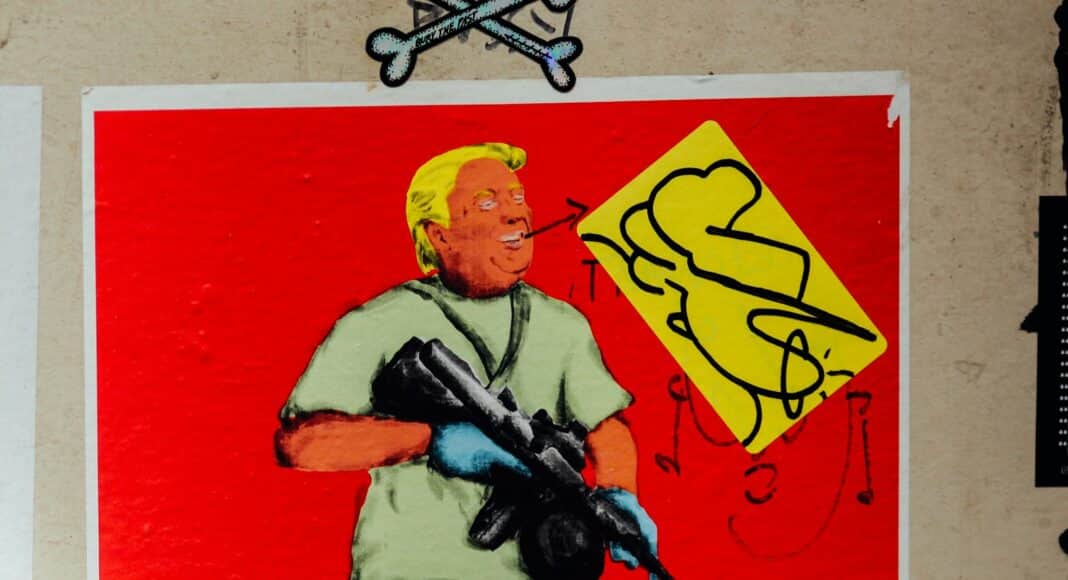 man in blue shirt holding rifle painting