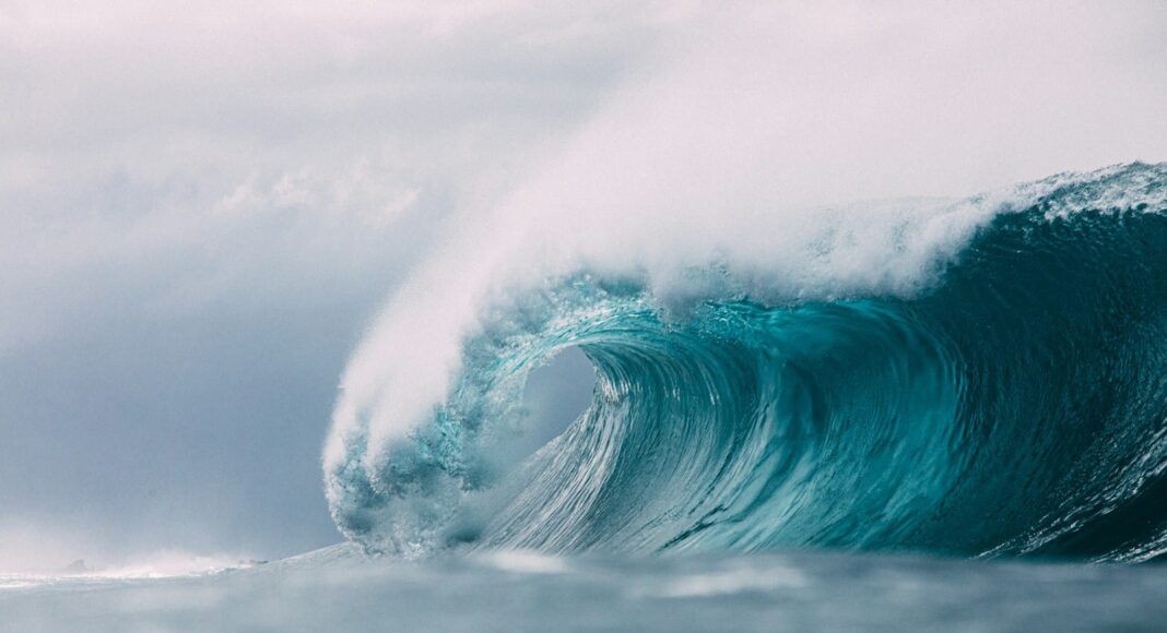 white and blue ocean waves