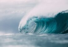 white and blue ocean waves