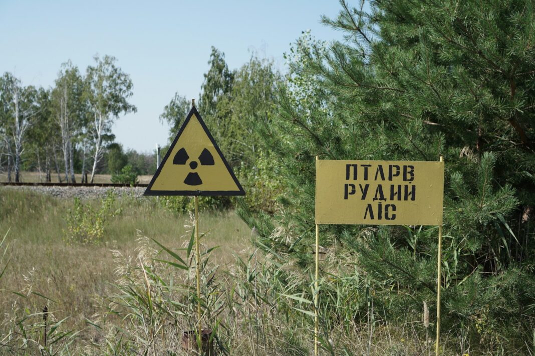 yellow and black road sign