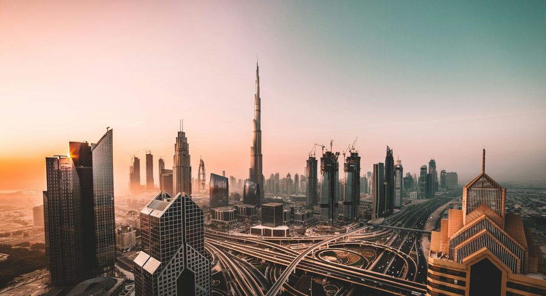 aerial photo of city highway surrounded by high-rise buildings