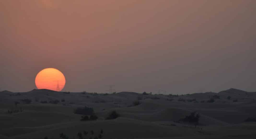 snow covered mountain during sunset