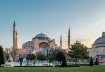 brown concrete building under blue sky during daytime