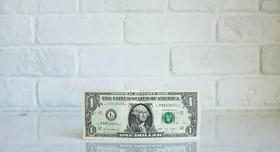 1 U.S. dollar banknote on white surface