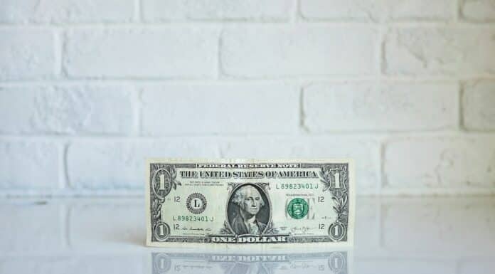 1 U.S. dollar banknote on white surface