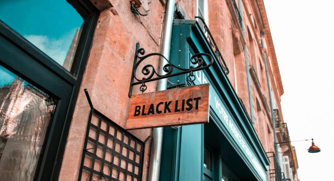 a sign that is on the side of a building