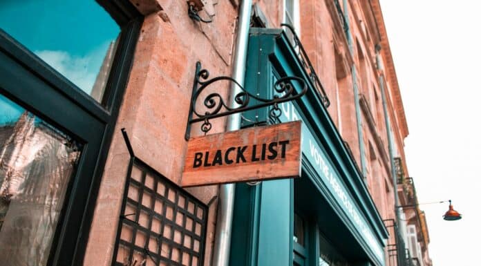 a sign that is on the side of a building