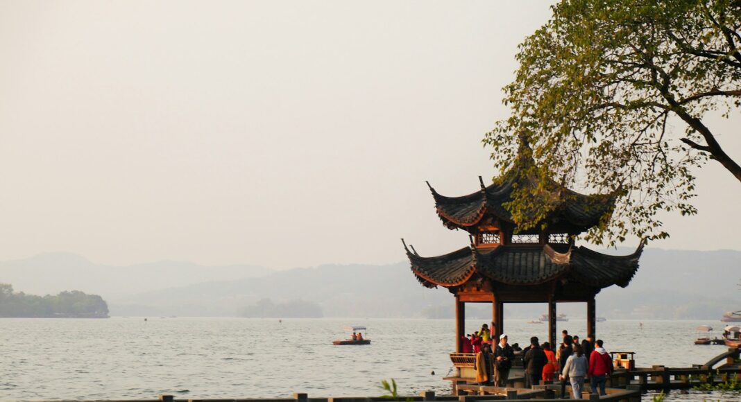 people on brown wooden dock during daytime