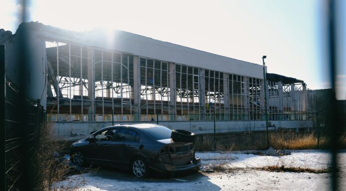 a car that is parked in front of a building
