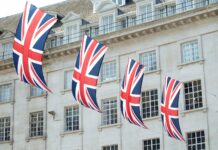 United Kingdom flags hanged near building
