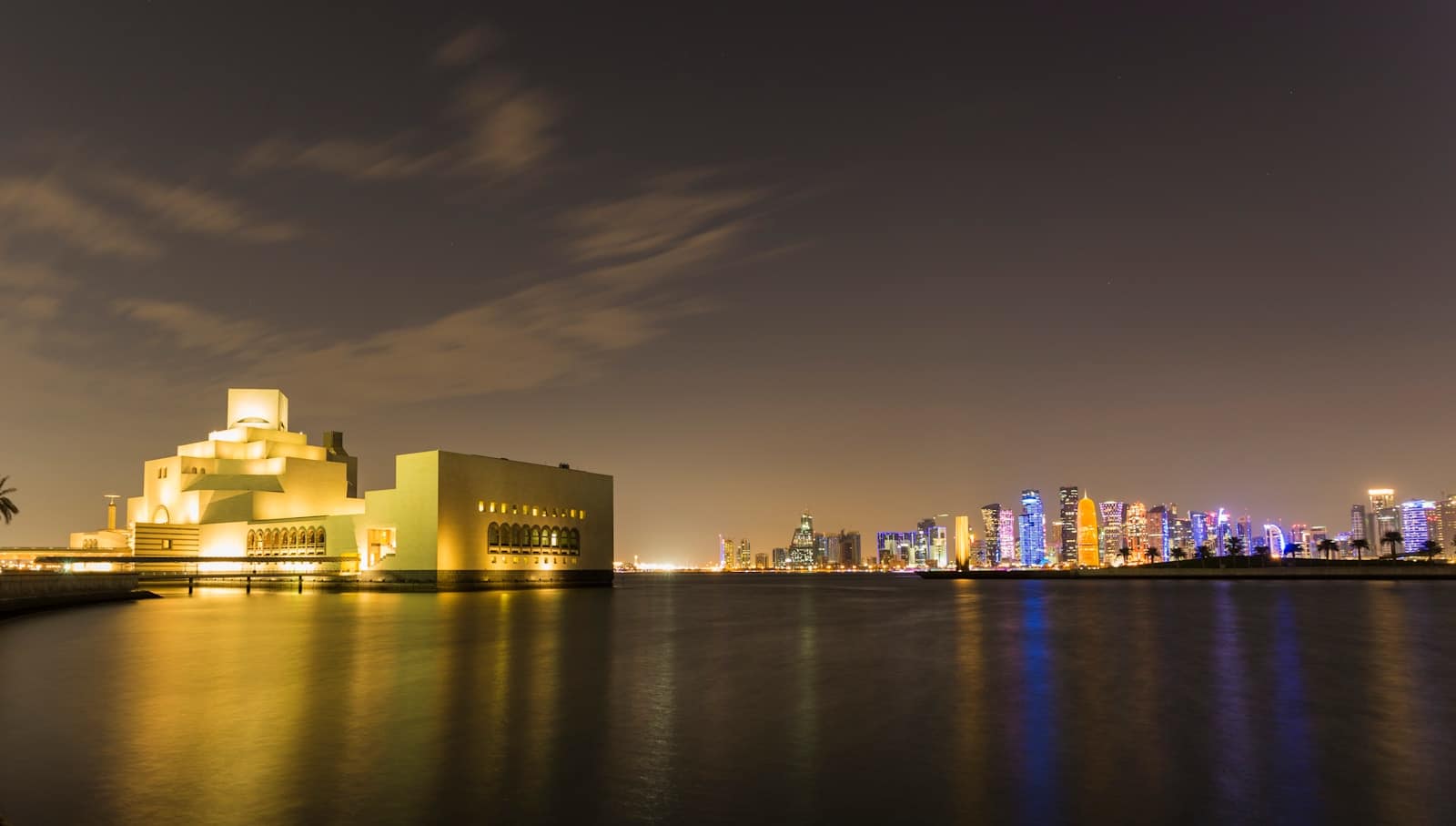 body of water near buildings