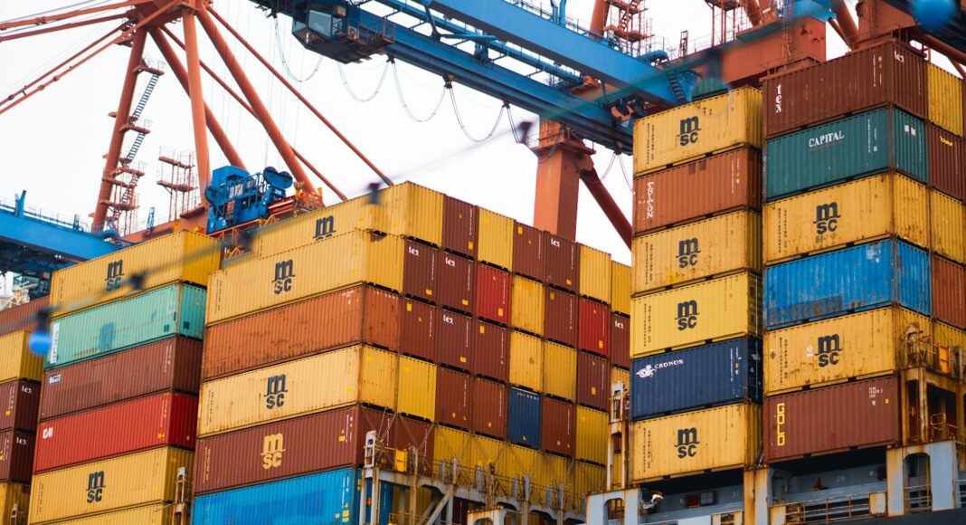a large cargo ship loaded with lots of containers