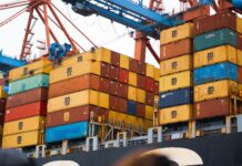 a large cargo ship loaded with lots of containers