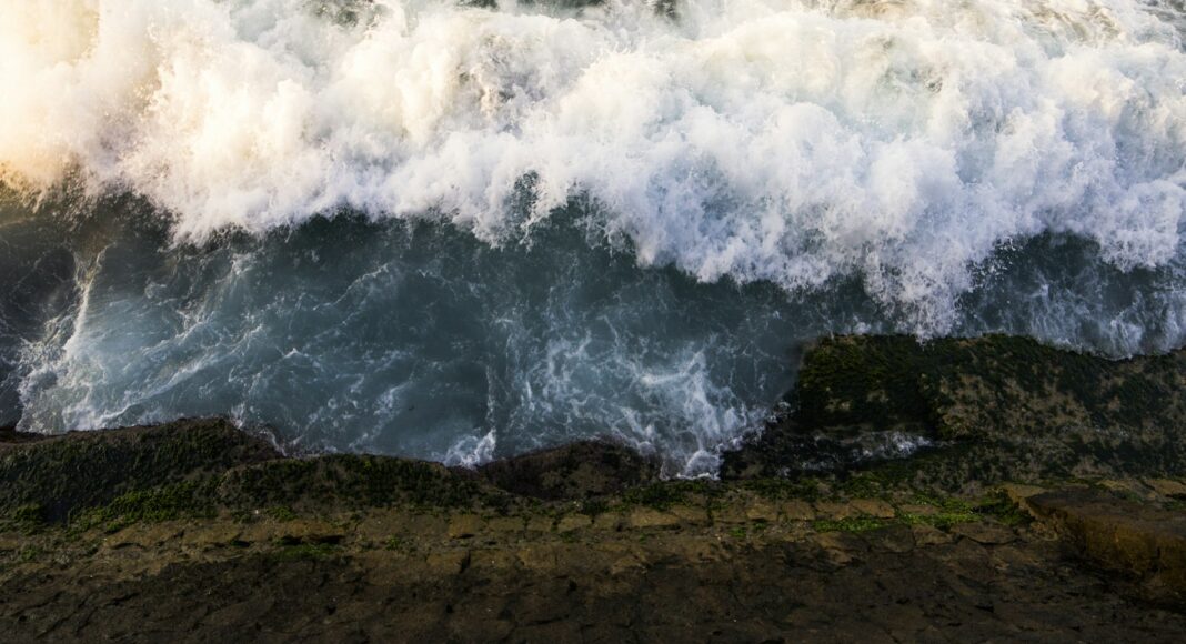ocean waves hitting the rocks