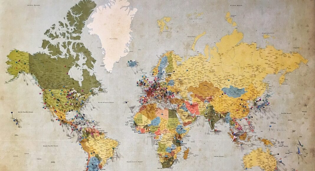 blue, green, and yellow world map