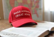a red hat that reads make america great again