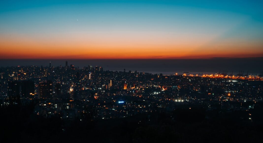 city skyline during night time