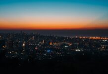 city skyline during night time