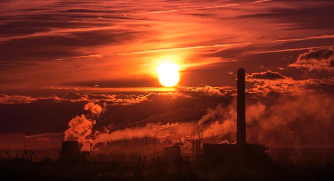 tall building under orange clouds at daytime
