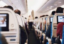 shallow focus photography of people inside of passenger plane